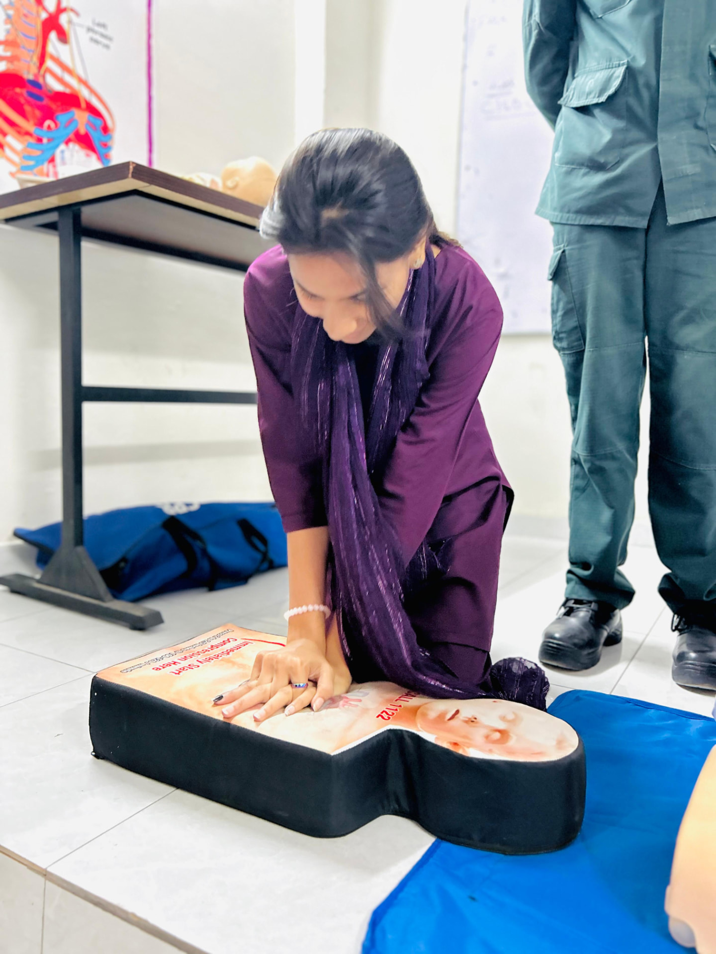 Practical CPR on a training manikin